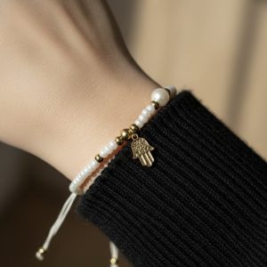 Bracelet hamsa perles blanches et dorée